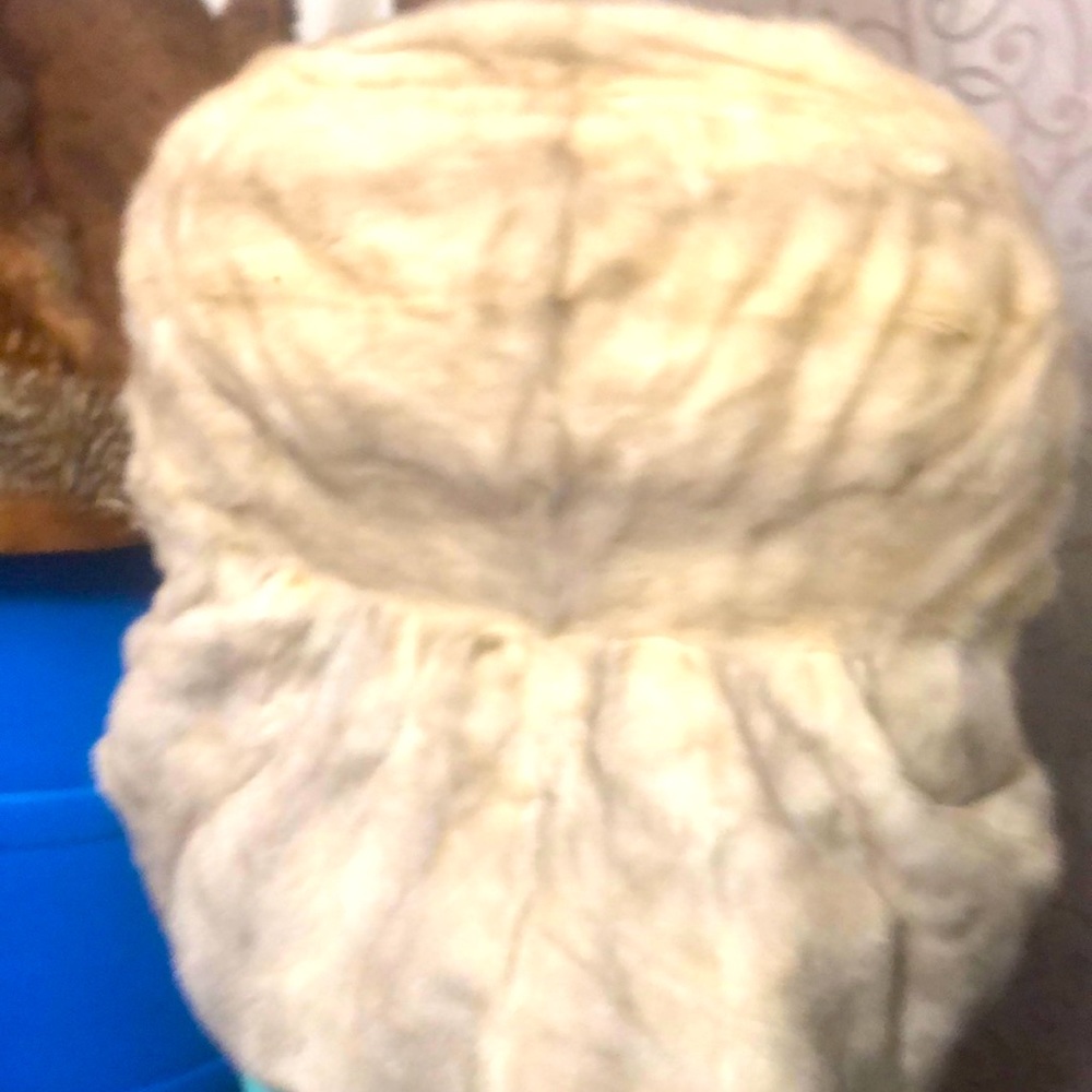 Woman coat fur maybe rabbit
